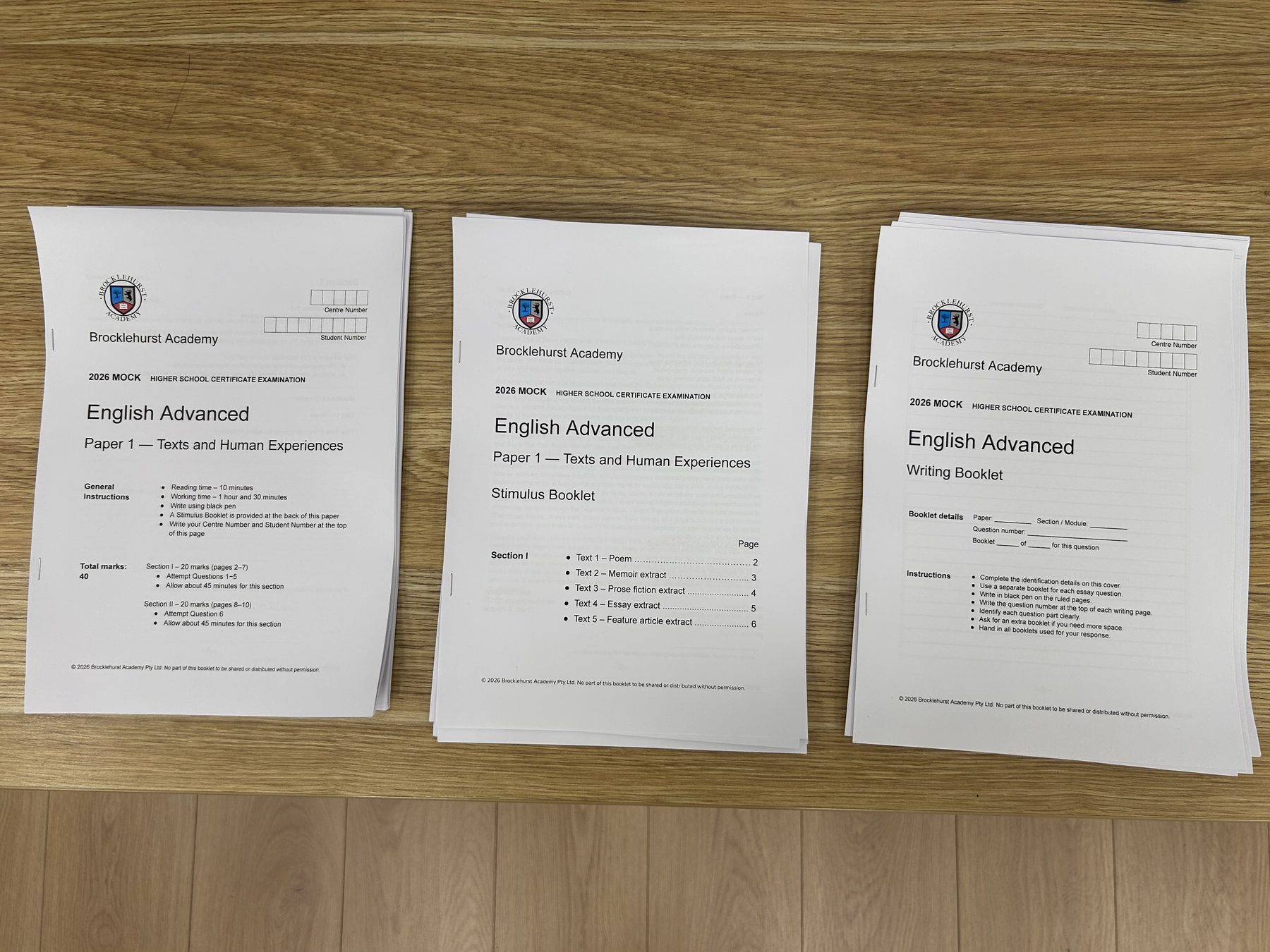 Brocklehurst Academy English Advanced mock exam papers on a desk